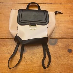 Nine West cream and black backpack purse never used.